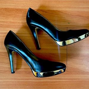 Nine West black leather heels w/silver platform. In great condition!